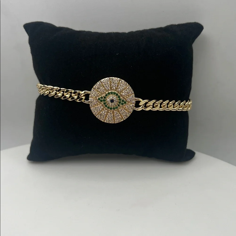 045. 18k Gold Plated Evil Eye Bracelet with green accents 7 1/4”